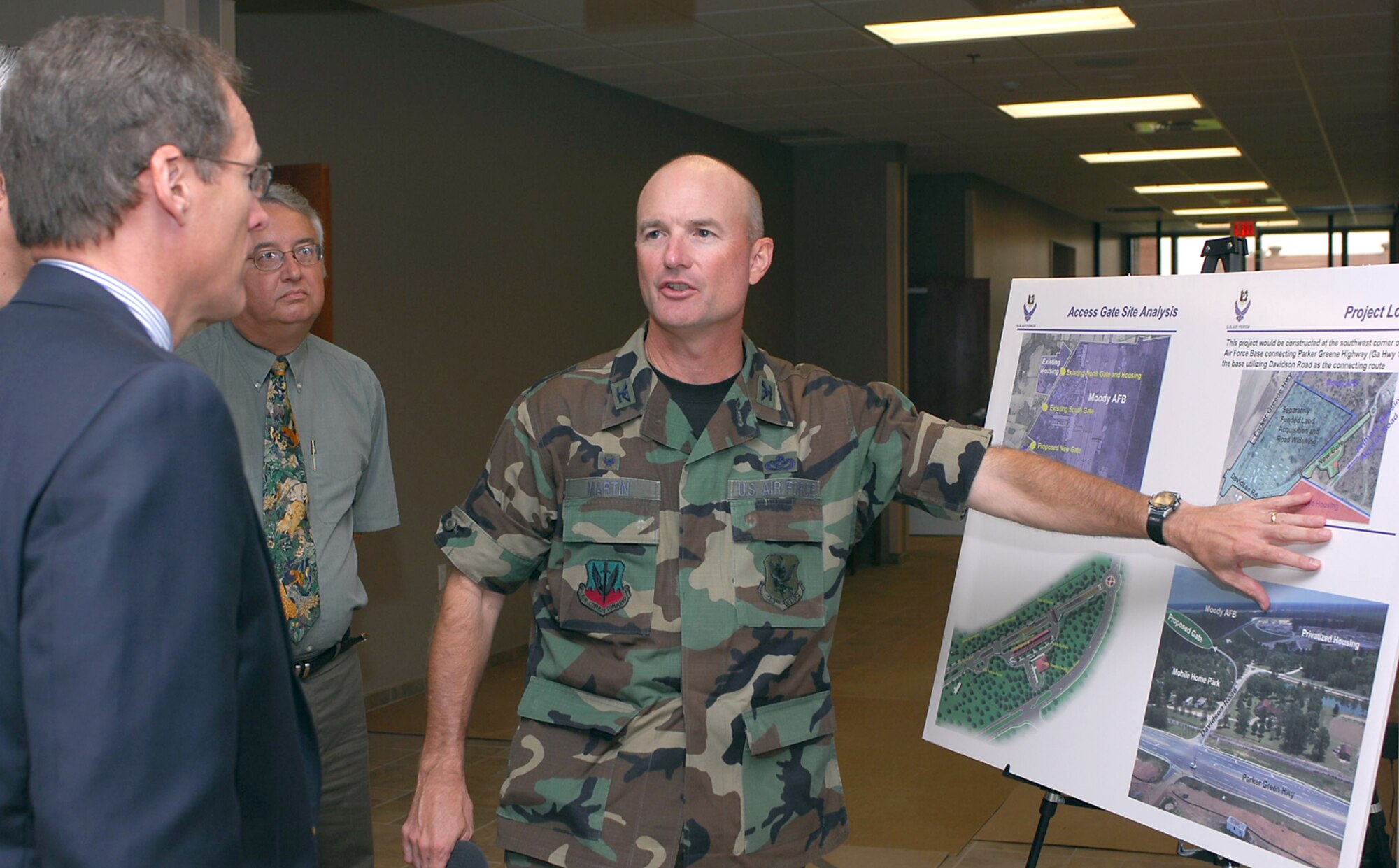 Col. Leslie Martin, 23rd Mission Support Group commander, briefs Georgia Congressman Jack Kingston on future construction at Moody during a tour July 30. The congressman visited the new Consolidated Base Support Center and other Moody facilities during the tour. (U.S. Air Force photo by Senior Airman Angelita Lawrence)