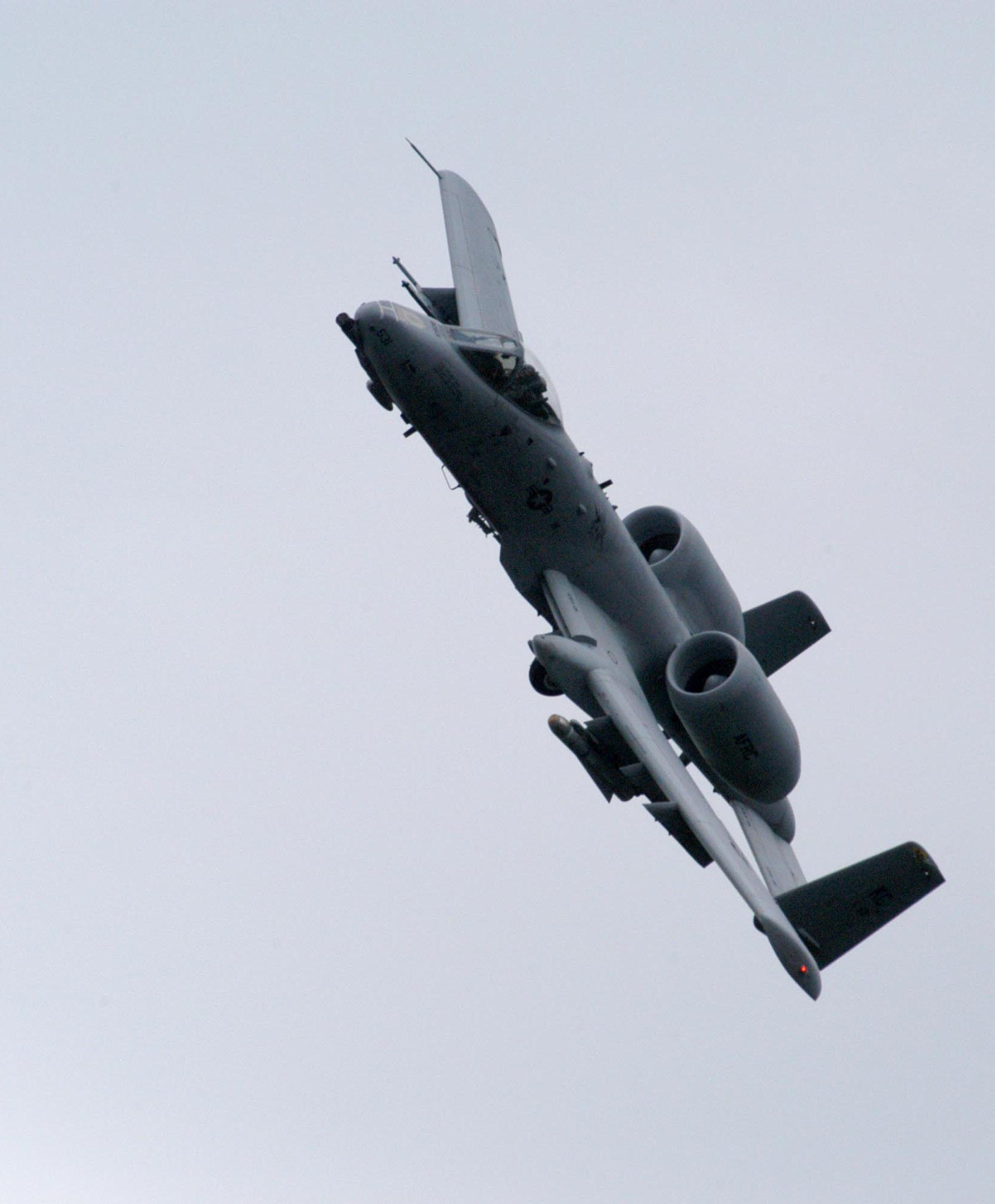 Col. Herman Brunke, chief of the Operational Capabilities Requirements Division at Headquarters Air Force Reserve Command and an A-10 pilot, banks a 303rd Fighter Squadron A-10 Thunderbolt II over Cannon Range near Ft. Leonard Wood, Mo., June 20, 2007.  The 303rd is part of the Air Force Reserve's 442nd Fighter Wing at Whiteman Air Force Base, Mo.  The squadron flies virtually every day to Cannon Range to train for close air support and other combat missions.  The range is managed by the Missouri Air National Guard's 131st Fighter Wing and serves as a vital training facility for Reserve, Guard and active-duty pilots from across the country. (U.S. Air Force photo/Maj. David Kurle)