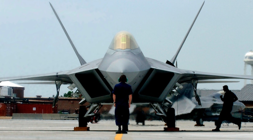 F-22A Raptor Demonstration Team aircraft maintainers prepare to launch out Maj. Paul "Max" Moga, the first F-22A Raptor demonstration team pilot, July 13. (U.S. Air Force photo/Senior Airman Christopher L. Ingersoll)