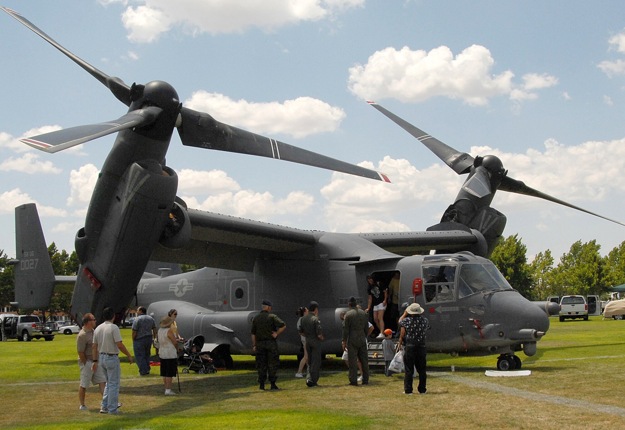 Bash attendees tour a CV-22 Osprey on display by the 71st Special Operations Squadron. U.S. Air Force photo by Todd Berenger