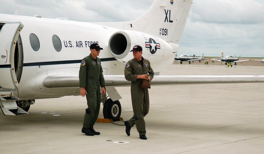 LAUGHLIN AIR FORCE BASE, Texas – The victors, 1st Lt. Aaron Urbanovsky and Capt. John Mirtich, 86th Flying Training Squadron, step from their jet toward a crowd of cheering friends, family and coworkers on return from the 2007 Air Mobility Rodeo.  (U.S. Air Force photo by Staff Sgt. Austin M. May)