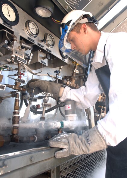 Senior Airman David Terry, 60th Component Maintenance Squadron electrical environmental journeyman, executes a cold purge on a nitrogen service truck. The nitrogen is non-flammable and is stored at 327 degrees below zero. The nitrogen is used on C-5 Aircraft for fuel tank fire fighting. (U.S. Air Force photo/Nan Wylie)