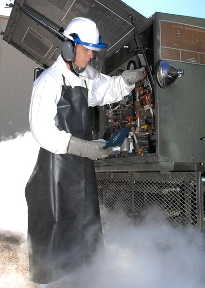 Senior Airman David Terry, 60th Component Maintenance Squadron electrical environmental journeyman, executes a cold purge on a nitrogen service truck. The nitrogen is non-flammable and is stored at 327 degrees below zero. The nitrogen is used on C-5 Aircraft for fuel tank fire fighting. (U.S. Air Force photo/Nan Wylie)
