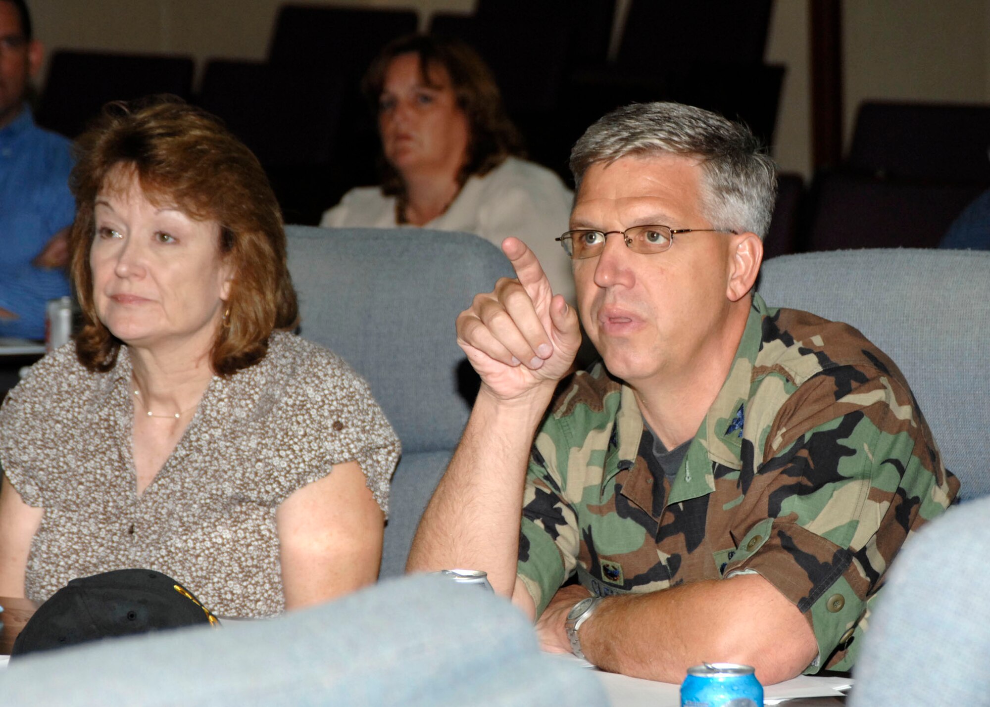 EGLIN AIR FORCE BASE, Fla.--Kathryn Halvorson, AF Real Property Agency director and Col. Dean Clemons, 96th Air Base Wing commander, listen to a briefing at the Lean event for the Enhance Use Lease program. The Air Force Real Property Agency sponsored the event which was attended by Air Force, Air Force Materiel Command and Eglin staff members. (U.S. Air Force photo by Mike Fleck)