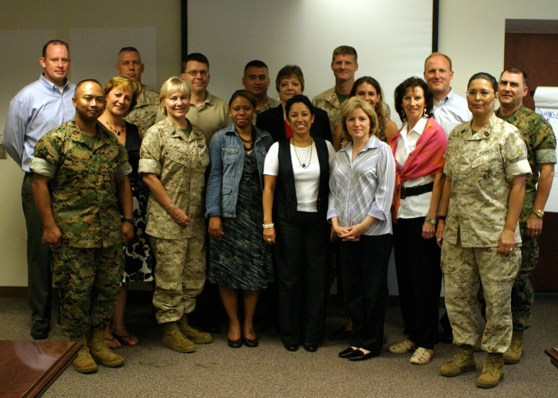 MARINE FORCES RESERVE, New Orleans ? (Aug. 1, 2007) Completing the training is the first step to obtaining certification to be able to facilitate Four Lenses  temperament training for MarForRes. (Back row from left) Bryan Jukes (training facilitator), Lt. Col. Lance Daniels, Navy Lt. Cmdr. Kirk Crocco, Master Sgt. Bobby Tagel, Deb Edgington, Maj. James Sellers, Deanna Storer, David Graff (training facilitator), and Navy Cmdr. Terry W. Cook.  (Front row from left) Chief Warrant Officer 3 Samuel Pamoleras, Susan Hare, Navy Chief Petty Officer Nanette Johnson, Michelle Bocage, Cori Kinnerup, Connie Bryant, Cindy Bergman, and Master Sgt. Cindy Garcia.