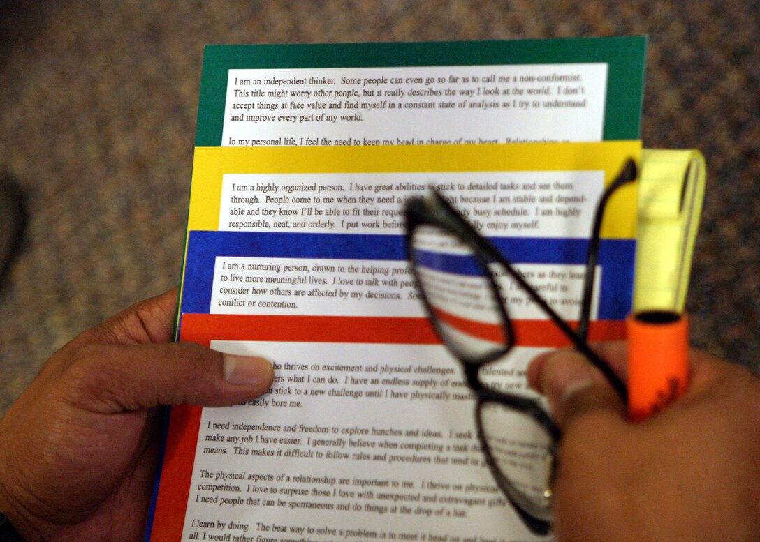 The training commenced with a color-coded Four Lenses multi-step personality test designed to enable participants to gain insight into their temperament types.  Individuals identify strengths within their temperament preferences and then learn how to effectively interact with other temperament types.   (Official  USMC photo by Cpl. Brandon S. Mountain)