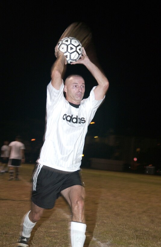 Warriors forward Robert L. Warnick hurls a out of bounds ball back into the game after being kicked out by a Pegasus defender.