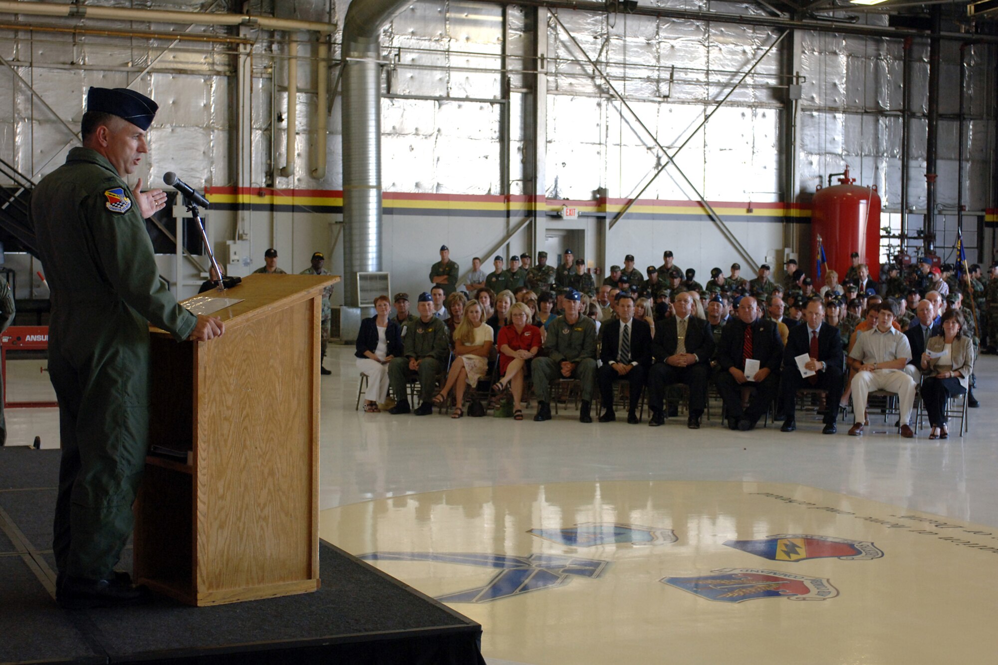 Col. Scott Dennis, 388th Fighter Wing commander, addressed the wing during the 388th FW assumption of command ceremony July 30 in Hangar 37. Col. Dennis spent a year as commander of the 332nd Expeditionary Operations Group at Balad Air Base, Iraq, before his assignment with the wing.


