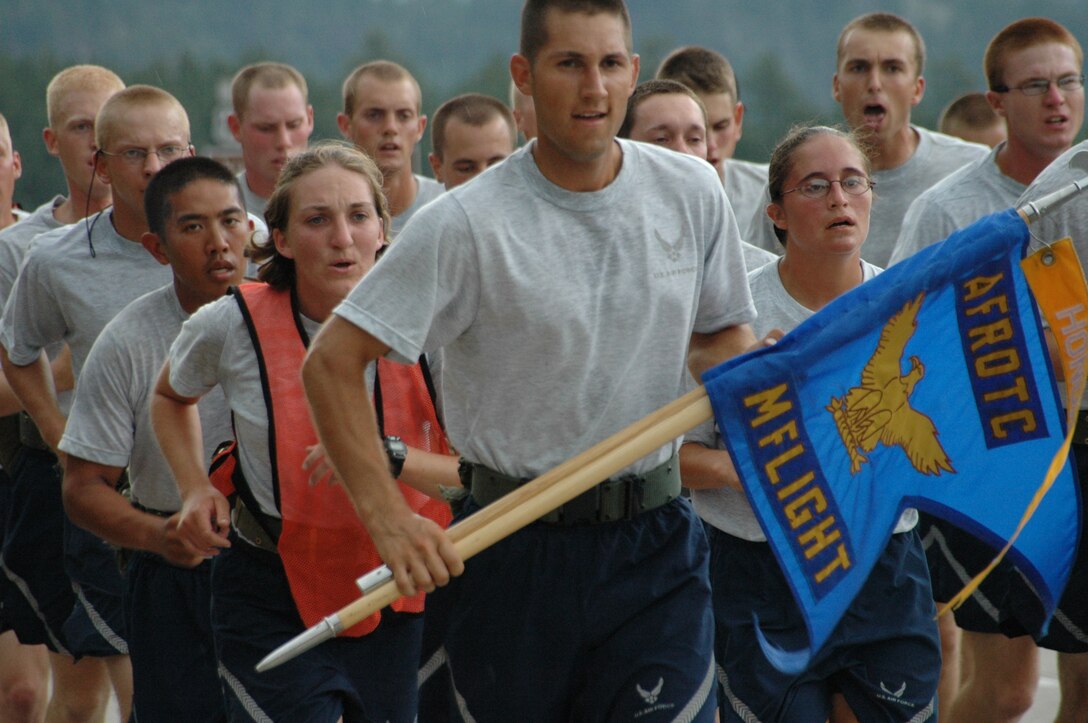 Determination and pride wins over rough terrain and an uphill battle to the top! Reserve Officer Training Corps cadets finish their grueling run from keystone S.D., to Mount Rushmore’s amphitheater. At the amphitheater the cadets were given individual and team awards and were told by their commanding officer their training at Ellsworth better prepared them for their future commissioning as Air Force officers. (U.S. Air Force photo by Tech. Sgt. Steven Wilson)