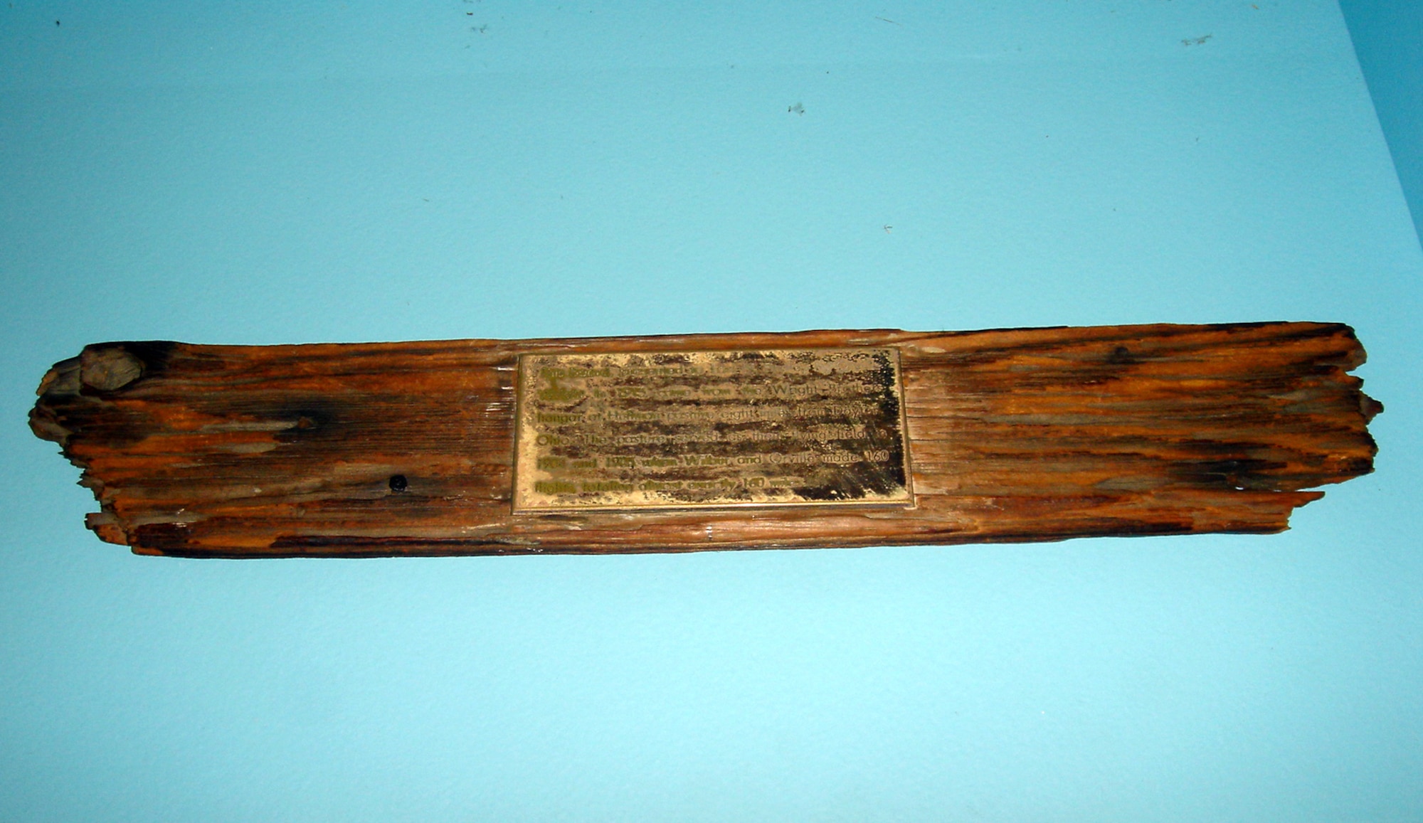 Orville Wright presented this board to Earl N. Finley in 1915. The board came from the Wright brothers' hangar at Huffman Prairie, located eight miles from Dayton, Ohio. Wilbur and Orville Wright made 160 flights while using Huffman Prairie as a flying field in 1904-1905. (U.S. Air Force photo)