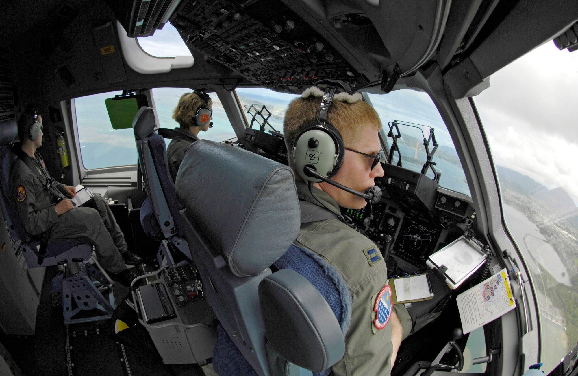 C-17 Globemaster III pilots take turns practicing assault landings at Marine Corps Base Hawaii, Kaneohe Bay, during a local training mission May 30. The pilots are from the 535th Airlift Squadron, Hickam Air Force Base, Hawaii. (U.S. Air Force photo/Tech. Sgt. Shane A. Cuomo)