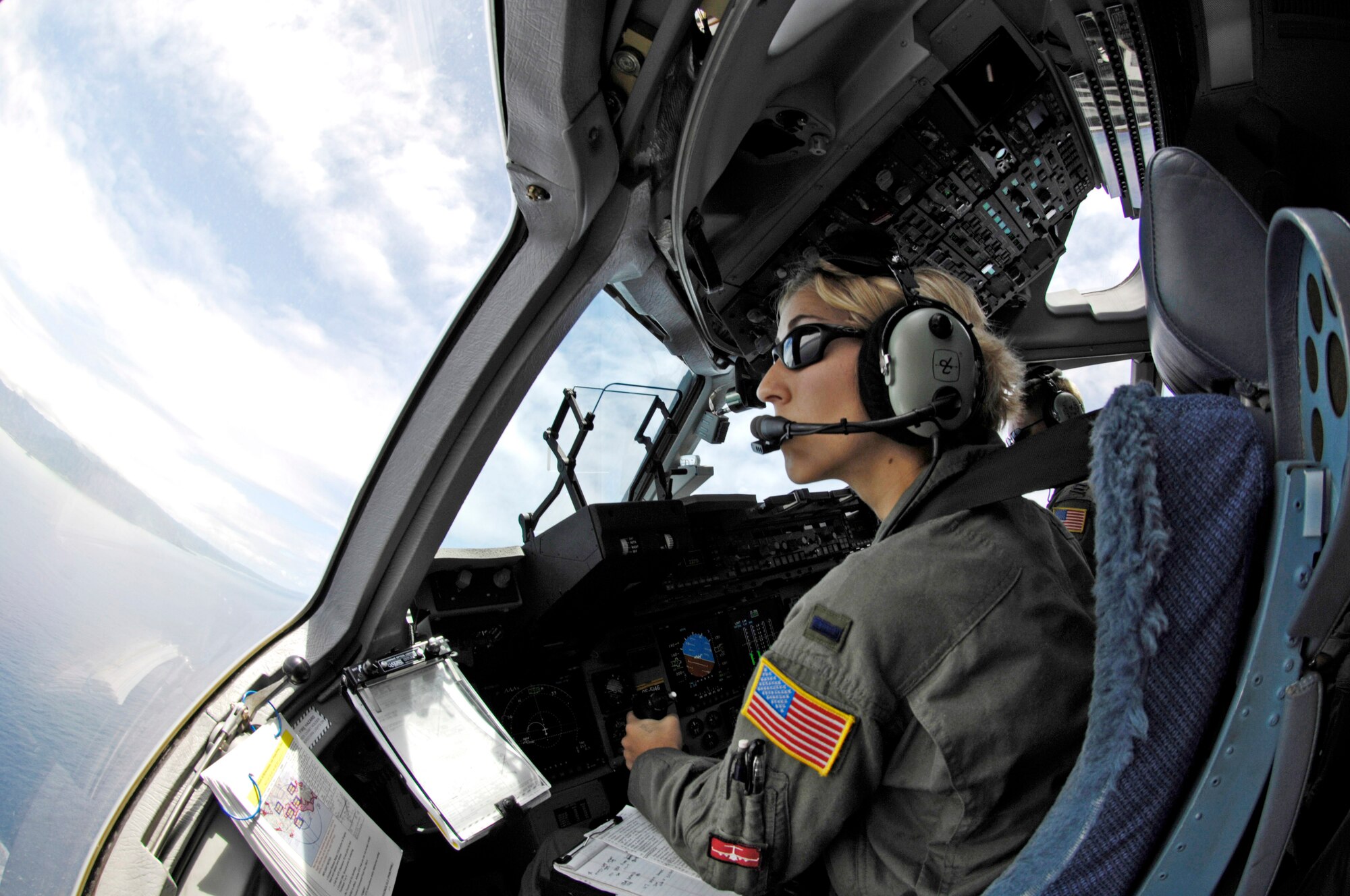 C-17 Globemaster III pilot 1st Lt. Lindsay McWhirter practices assault landings at Marine Corps Base Hawaii, Kaneohe Bay, during a local training mission May 30. Lt. McWhirter is from the 535th Airlift Squadron, Hickam Air Force Base, Hawaii. (U.S. Air Force photo/Tech. Sgt. Shane A. Cuomo)