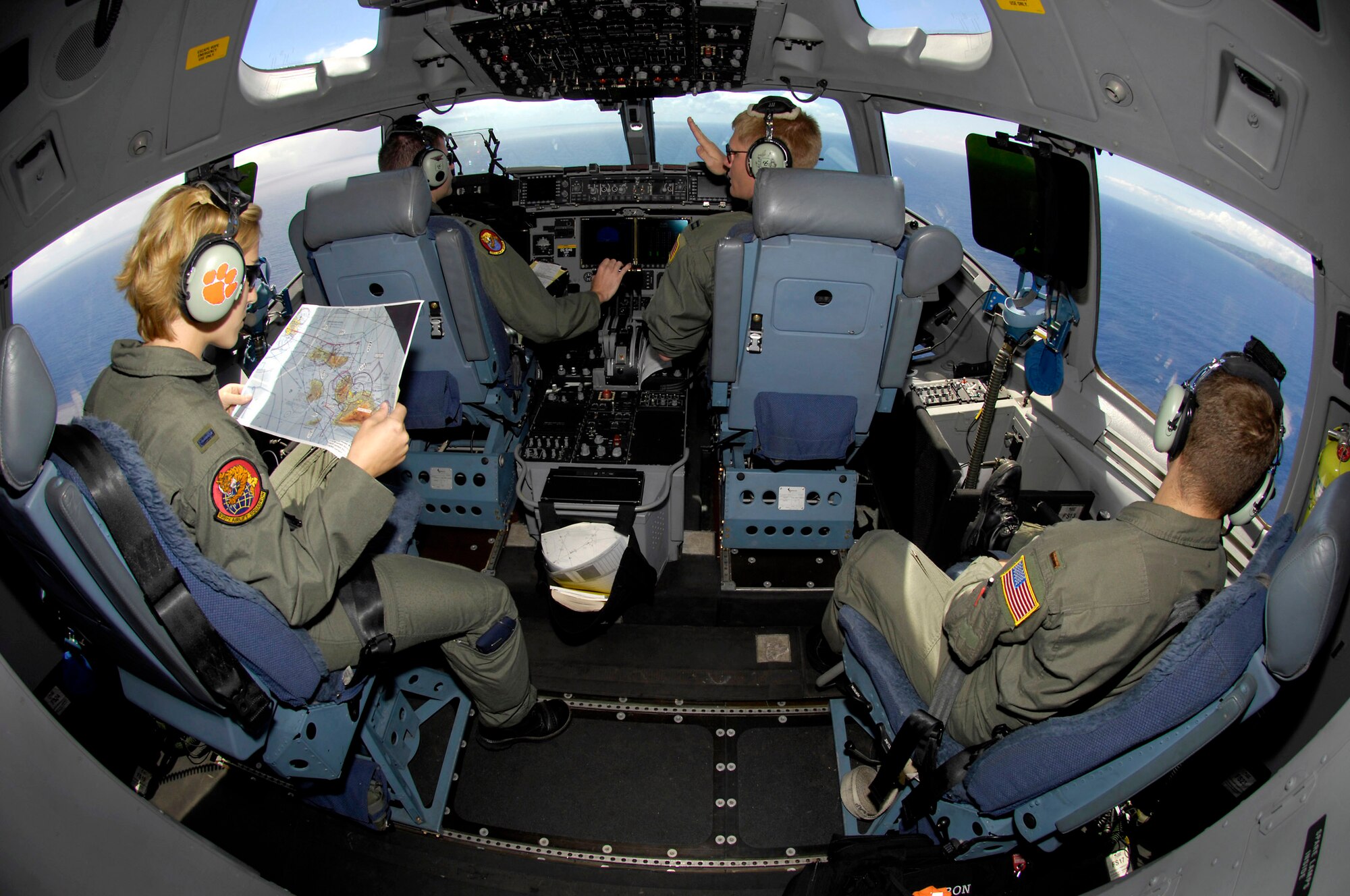 C-17 Globemaster III pilots take turns practicing low-level flying off the coast of Hawaii May 30. The pilots are from the 535th Airlift Squadron, Hickam Air Force Base, Hawaii. (U.S. Air Force photo/Tech. Sgt. Shane A. Cuomo)