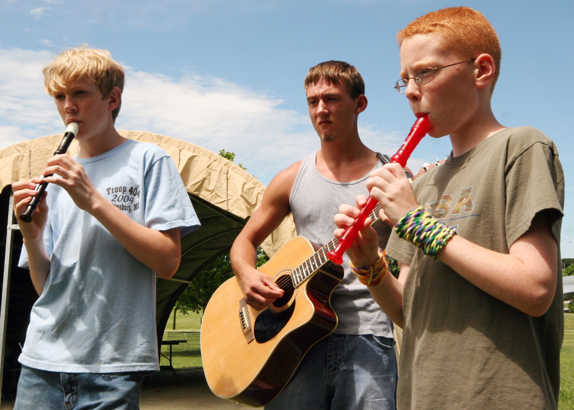 (Left to right) C.J. Templeton, Kenny Landreneau and Joe Mersky, provide background music for storytellers during the Whiteman Chapel's Vacation Bible School, "Marketplace 29 A.D." June 1. U.S. Air Force photo/Tech. Sgt. Matt Summers.