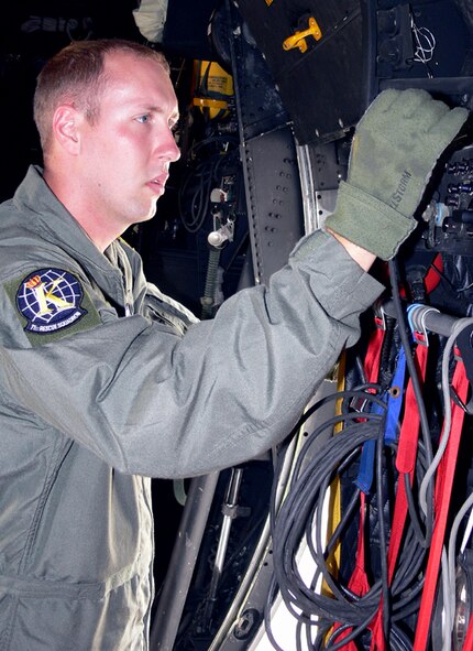 Staff Sgt. John McCashland, 71st Rescue Squadron loadmaster, does a preflight inspection on an HC-130 communication box. Sergeant McCashland was recently selected to attend Officer Training School. After OTS and HH-60 PaveHawk pilot training he will become a member of the California Air National Guard's 129th Rescue Wing at Moffett Air Field, Calif. (Photo by Airman 1st Class Eric Schloeffel)