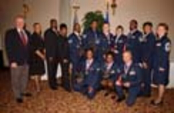 The evening's winners assemble with Honorary Commanders, and partnership representatives. (All U.S. Air Force photos/Master Sgt. Shayne Sewell)
