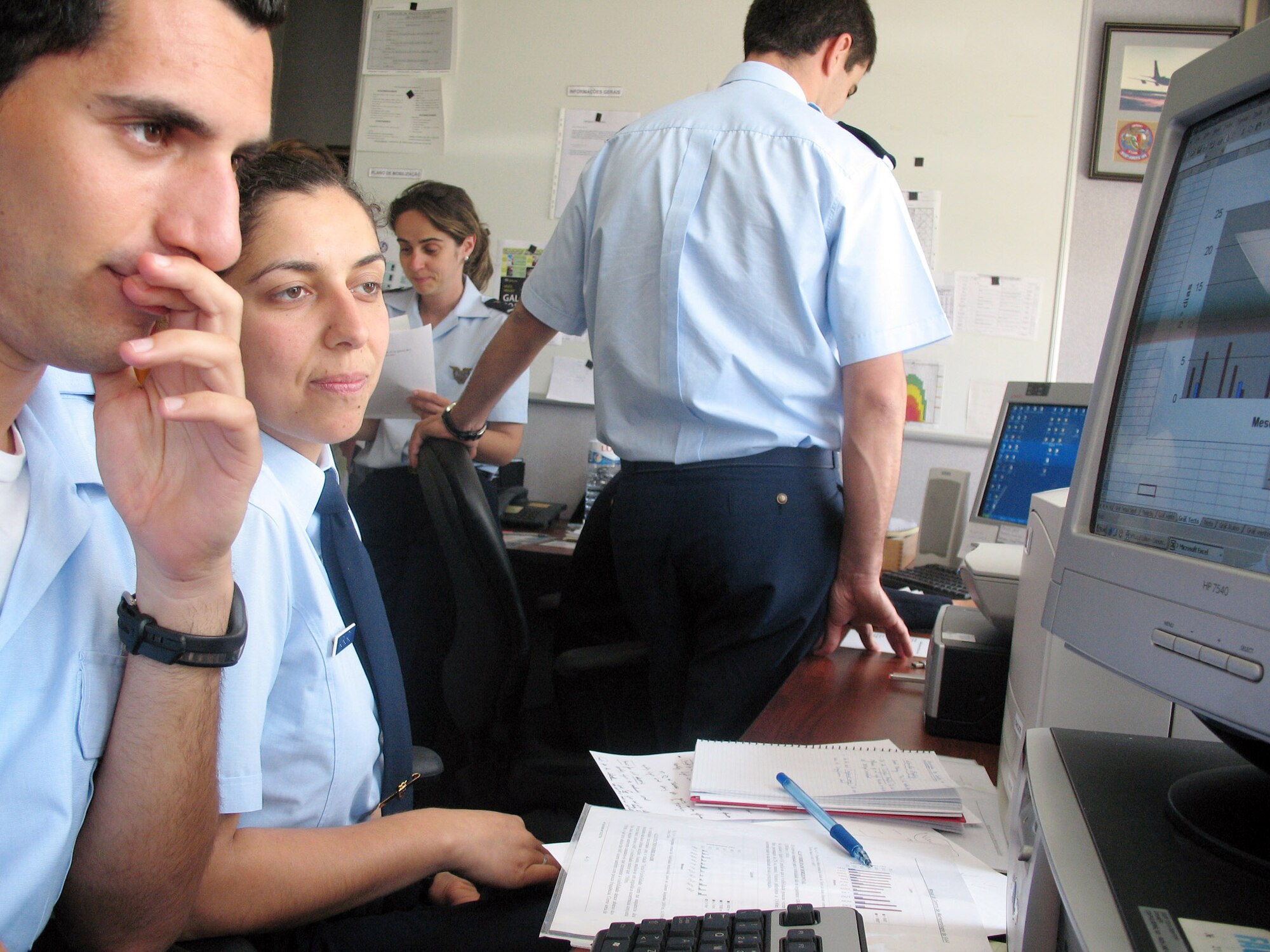 American and Portuguese servicemembers monitor the weather at 17 European locations, to provide up-to-the-minute information for pilots passing through June 1 at Lajes Field, the Azores. Before any flight can take off from Lajes Field, members of the 65th Operations Support Squadron Weather Flight provide an in-depth briefing covering the weather at the base, the destination, and all points in between. (U.S. Air Force photo/Senior Airman Ted Froats) 
