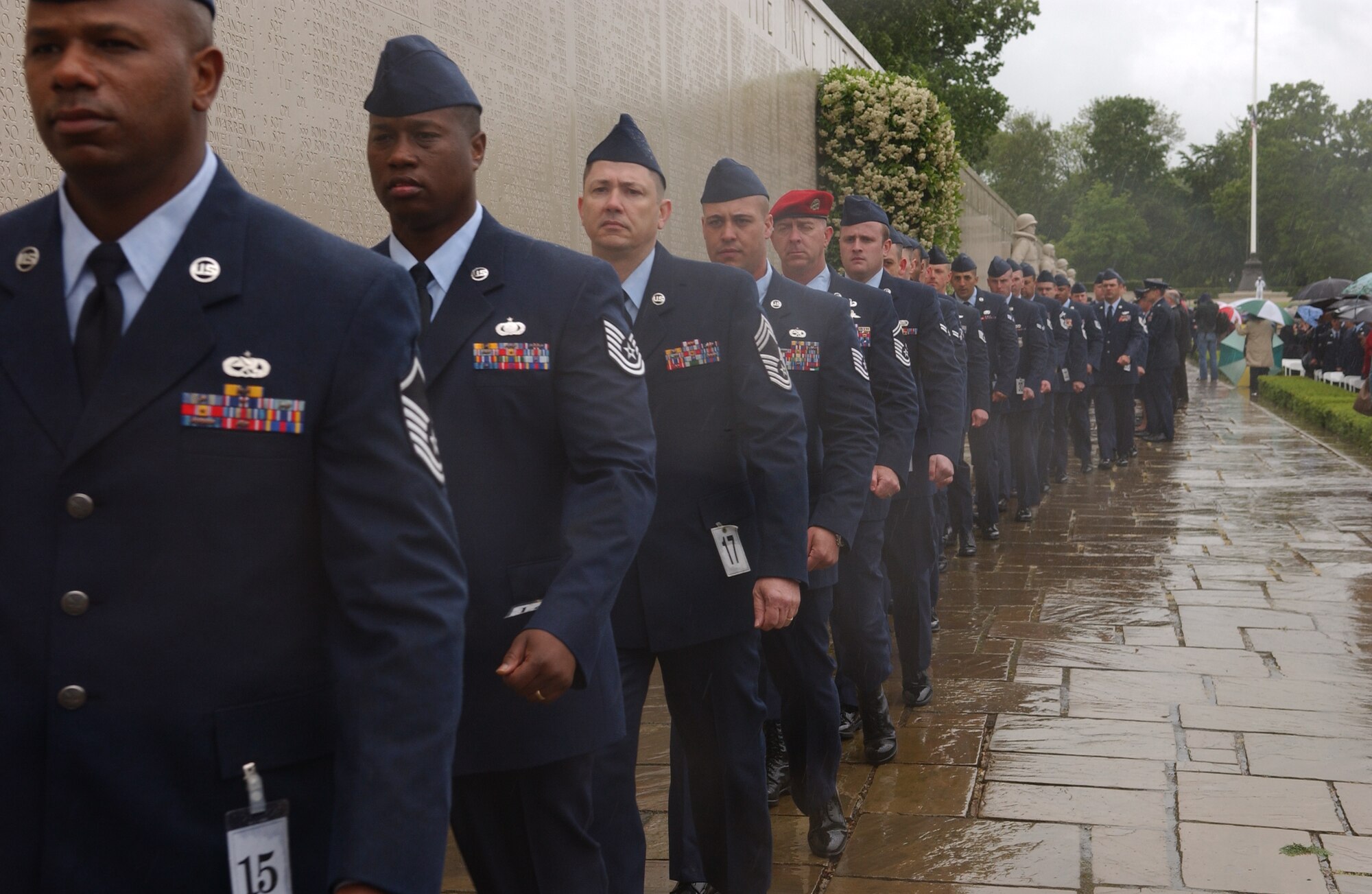 During the annual Memorial Day ceremony, 120 active duty wreath bearers from RAFs Mildenhall and Lakenheath march in the worst Memorial Day weather in 17 years, May 28, 2007. (Air Force photo by Tech. Sgt. Tracy L. DeMarco)