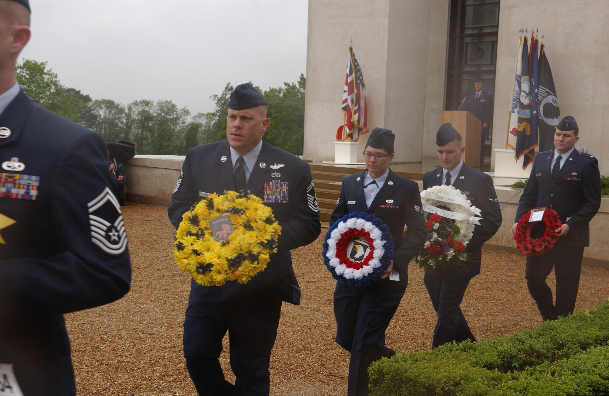 During the annual Memorial Day ceremony, 120 active duty wreath bearers from both RAFs Mildenhall and Lakenheath honored the 5,126 Americans who gave their lives, but whose remains were never recovered or identified, by marching in the worst Memorial Day weather in 17 years, May 28, 2007. (Air Force photo by Tech. Sgt. Tracy L. DeMarco)