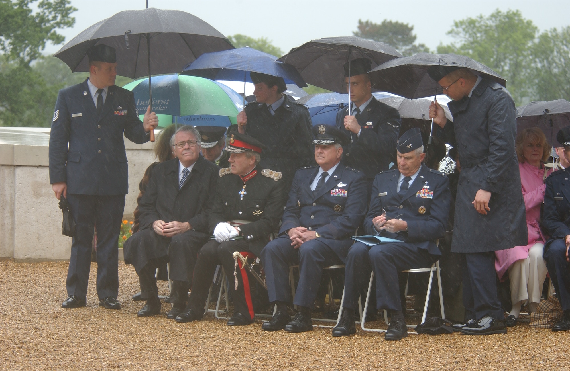 This year's distinguished guest list for the annual Memorial Day ceremony held at the Madingley World War II American Cemetery included U.S. Ambassador Robert H. Tuttle from London, Her Majesty's Lord Lieutenant Hugh Duberly of Cambridgeshire, Maj. Gen. Paul Fletcher, 3rd Air Force commander and U.S. Air Forces in Europe Command Chaplain Col. Carl Andrews, May 28, 2007. (Air Force photo by Tech. Sgt. Tracy L. DeMarco)