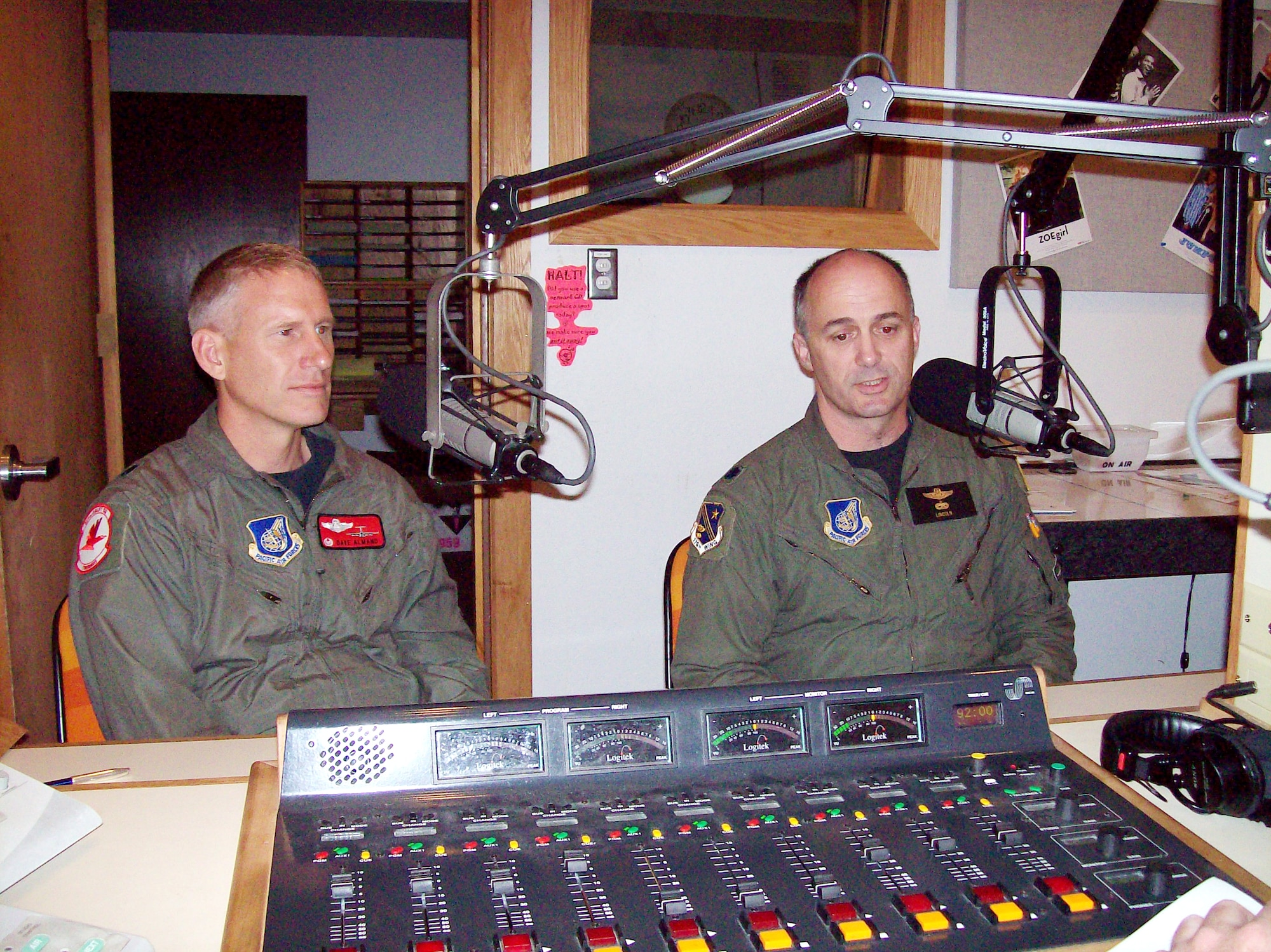 ELMENDORF AIR FORCE BASE, Alaska -- Lt. Cols. David Almand and Carlisle Lincoln are interviewed on KAFC 93.7 FM Tuesday about the upcoming C-17 arrival to Elmendorf. The C-17 Globemaster III replaces the C-130 for the active duty at Elmendorf and is an additional mission for the Alaska Air National Guard. Colonel Almand and Lincoln are the commanders for the 517th and 249th Airlift squadrons, respectively. (U.S. Air Force photo by Staff Sgt. Francesca Popp)