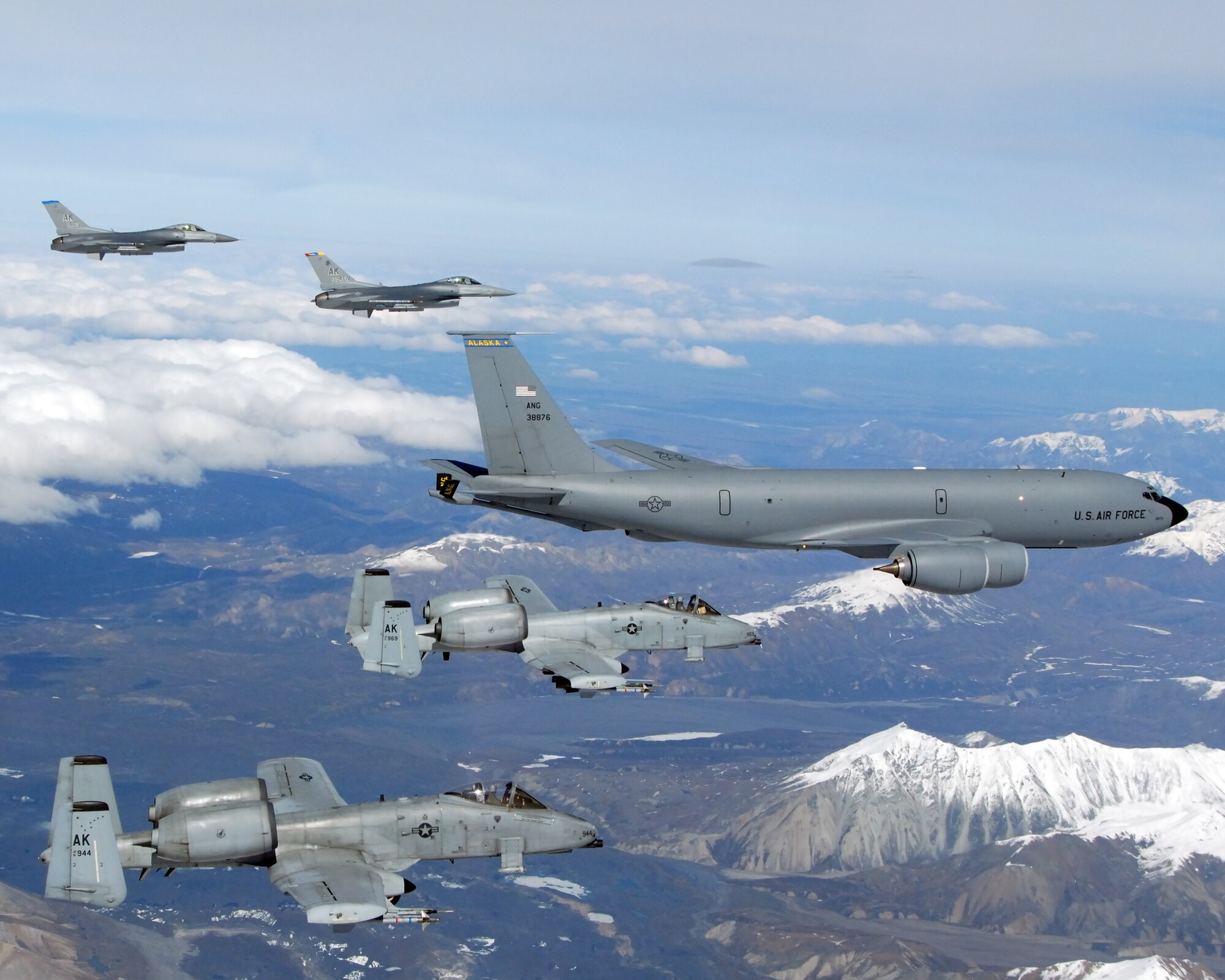EIELSON AIR FORCE BASE, Alaska -- A KC-135R Stratotanker, 168th Air Refueling Wing, Alaska Air National Guard, flies in formation with two F-16 Fighting Falcons from the 18th Fighter Squadron, and two A-10 Warthog II's from the 355th Fighter Squadron on May 29, 2007.  The five aircraft assigned to Eielson flew in formation for the last time due to the deactivation of the 355th FS, and the 18th FS.  (U.S. Air Force photo by Master Sergeant Rob Wieland) 
