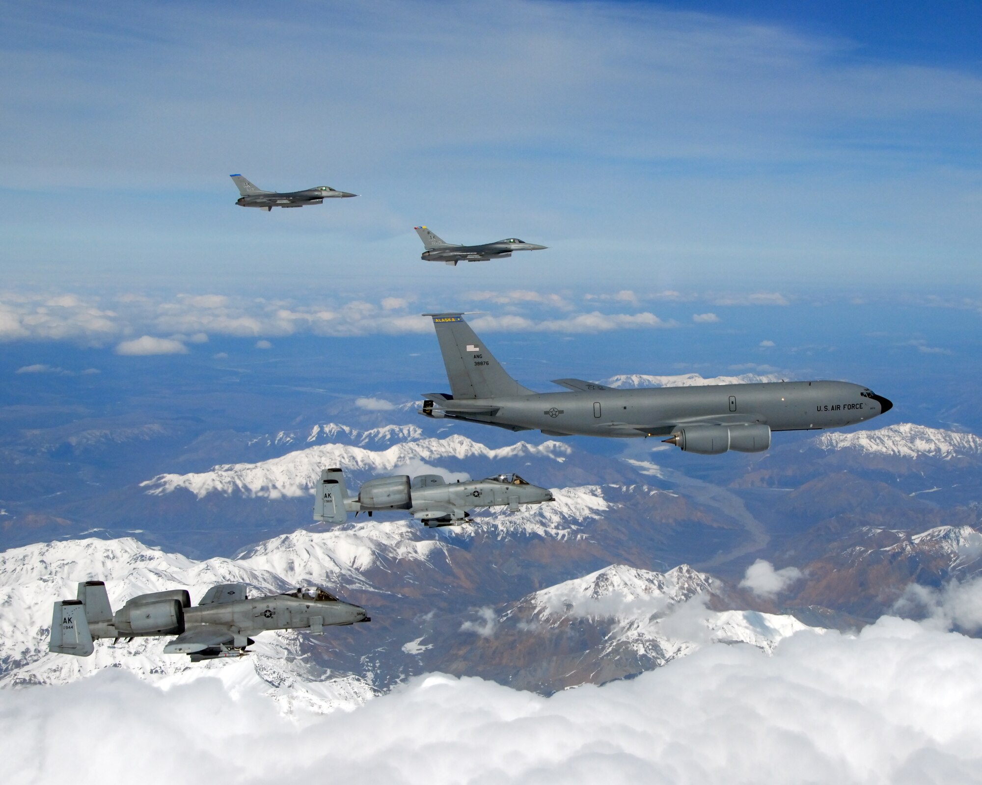 EIELSON AIR FORCE BASE, Alaska -- A KC-135R Stratotanker, 168th Air Refueling Wing, Alaska Air National Guard, flies in formation with two F-16 Fighting Falcons from the 18th Fighter Squadron, and two A-10 Wathog II's from the 355th Fighter Squadron May 29, 2007.  The five aircraft assigned to Eielson flew in formation for the last time due to the deactivation of the 355th FS, and the 18th FS.  (U.S. Air Force photo by Master Sergeant Rob Wieland)