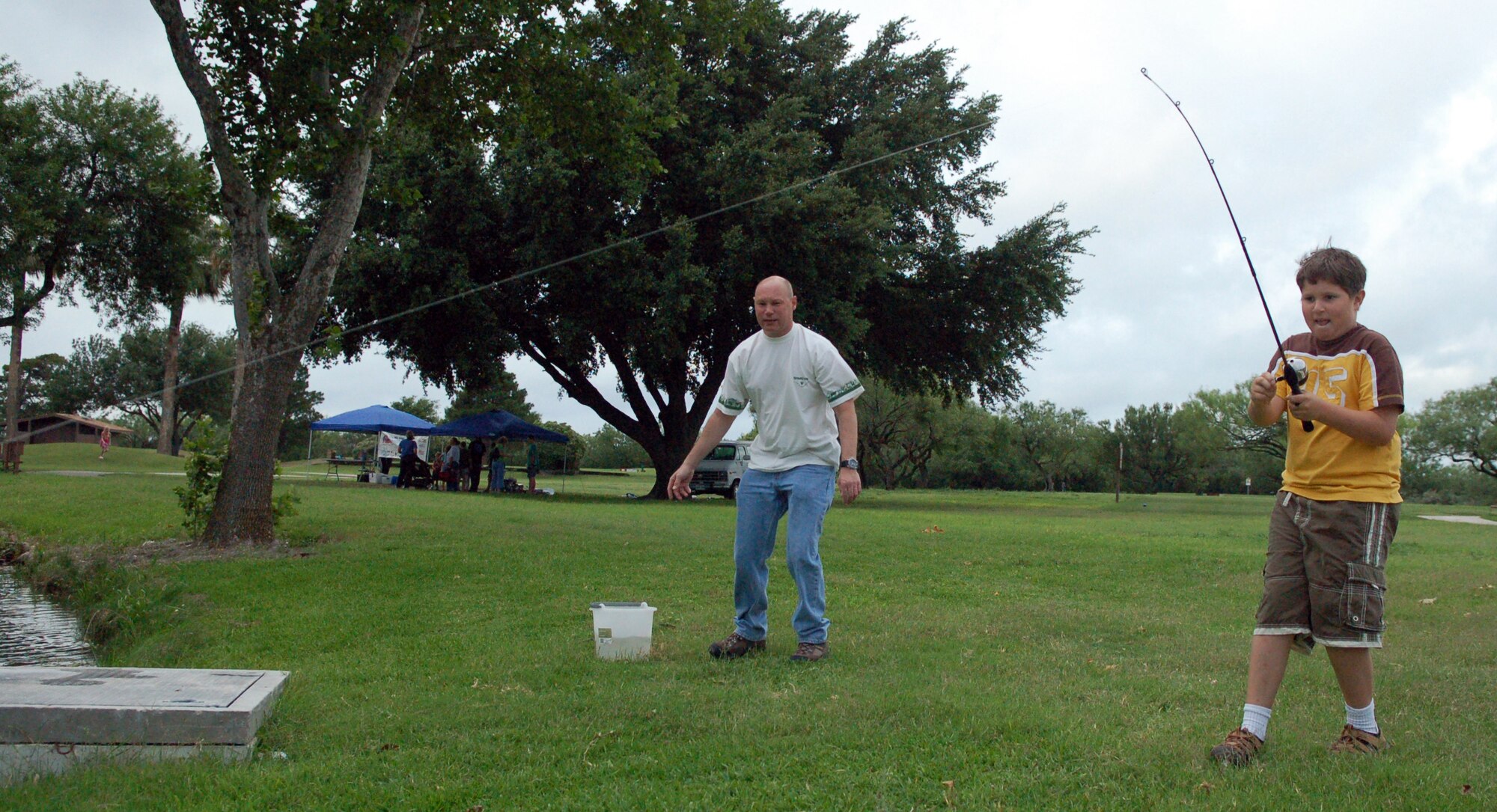 LAUGHLIN AIR FORCE BASE, Texas -- Ryan Gorshe, son of retired Master Sgt. Tim Gorshe, takes to higher ground as he attempts to reel in his second catch of the tournament.  (U.S. Air Force photo by Staff Sgt. Austin M. May)