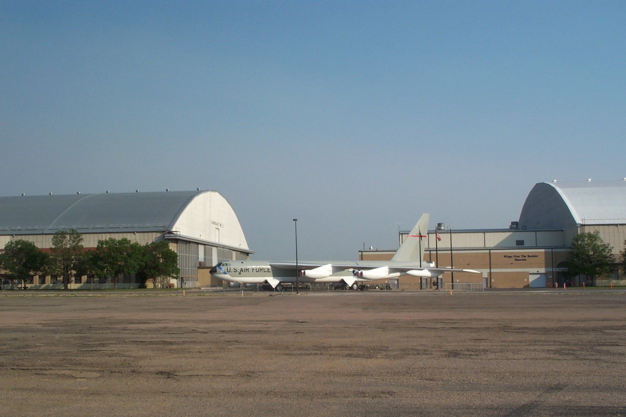 A B-52D bomber sits between Hangars 1 and 2 on the former Lowry AFB, Colo. While there are no longer runways adjacent to these buildings, the hangars are enjoying new life as an aviation museum.