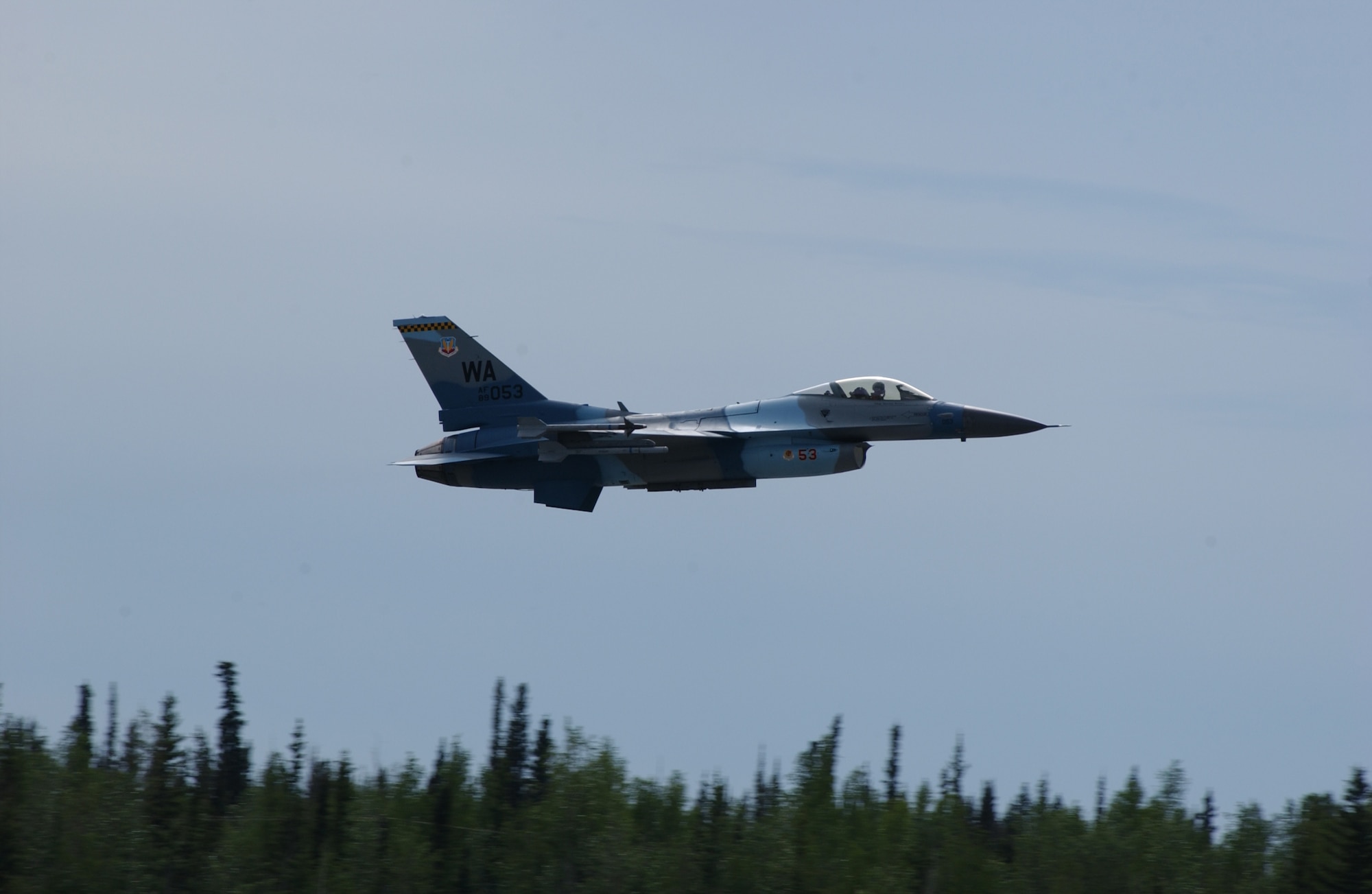 EIELSON AIR FORCE BASE, Alaska -- An F-16 Fighting Falcon, 64th Aggressor Squadron, Nellis AFB, Nev., takes off for a mission for Red Flag-Alaska 07-2 June 4 here. RF-A 07-2 is a Pacific Air Forces-directed field training exercise for U.S. and coalition forces flown under simulated air-combat conditions. It is conducted on the Pacific Alaska Range Complex with air operations flown out of Eielson and Elmendorf Air Force Bases. (U.S. Air Force Photo by Airman 1st Class Jonathan Snyder) 