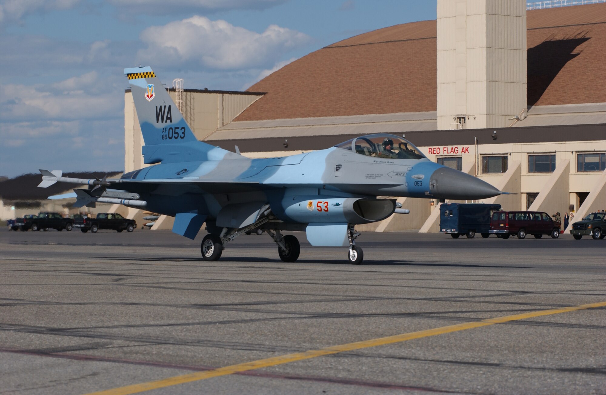 EIELSON AIR FORCE BASE, Alaska -- An F-16 Fighting Falcon, 64th Aggressor Squadron, Nellis AFB, Nev., taxis infront of the Thunderdome during Red Flag-Alaska 07-2 June 4 here. RF-A 07-2 is a Pacific Air Forces-directed field training exercise for U.S. and coalition forces flown under simulated air-combat conditions. It is conducted on the Pacific Alaska Range Complex with air operations flown out of Eielson and Elmendorf Air Force Bases. (U.S. Air Force Photo by Airman 1st Class Jonathan Snyder) 
