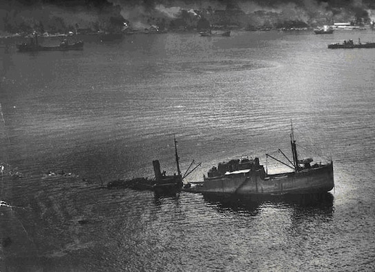 A merchant ship hit by 2nd Lt. Rich Walker during a bombing run against Rabaul, one of the major bases for the Japanese in the South Pacific in 1943.