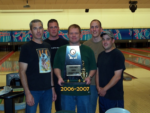 SPANGDAHLEM AIR BASE, GERMANY – The 726th Air Mobility Squadron intramural bowling team clinched the Intramural Bowling Commander’s Cup for the second consecutive year May 30. Team members from left to right take a moment to enjoy their victory Gary Grape, Eric Pylka, John Cottle, Jon Bakke and Jeremy Traughber. Additional, team members who helped capture of the trophy include Jason Goul, Greg Todd, Billy Webb, Gillie Zamora, Jerry Wells and Don Latham. (Courtesy photo)