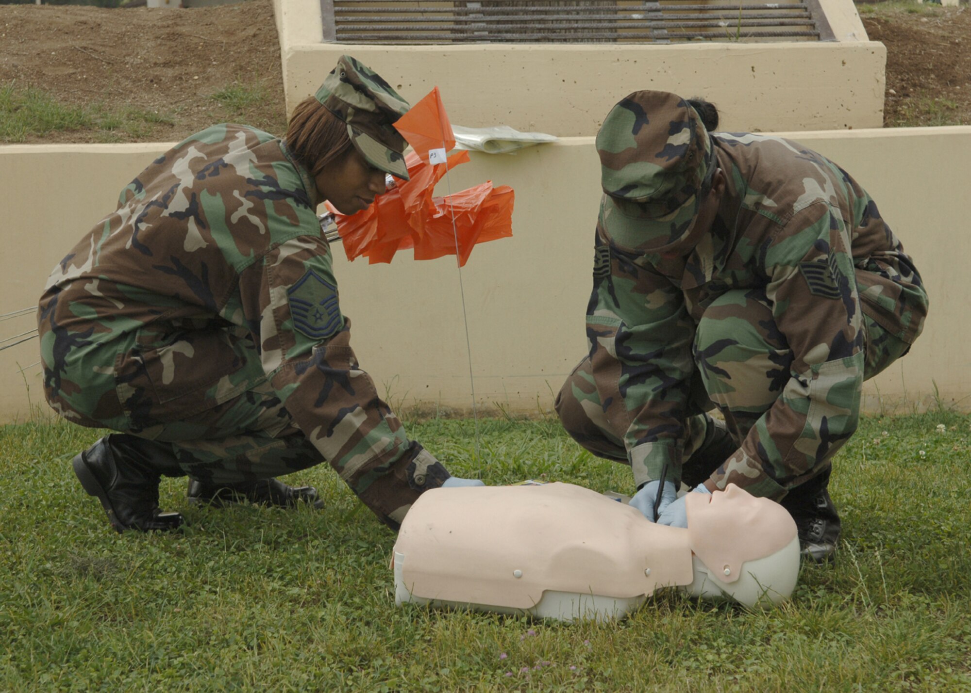 Master Sgt. Mary Curtis, 39th Services Squadron first sergeant and Tech Sgt. Jacquetta Smith, 39th Services Squadron mark items that were recovered during the Search and Recovery Training May 31. The training helped Airmen become more confident with their abilities in preparation for being called upon as an augmentee. (U.S. Air Force photo by Airman 1st Class Tiffany Colburn) (RELEASED)      