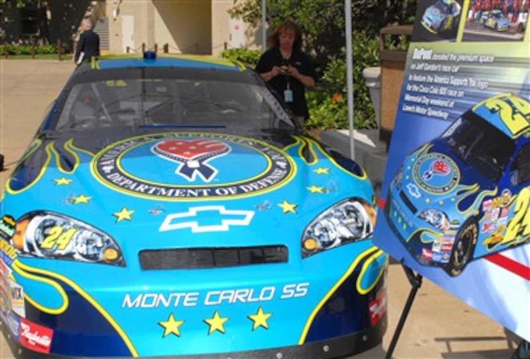 A replica of NASCAR driver Jeff Gordon's No. 24 car, which sports an America Supports You logo, sits in the courtyard of the Pentagon, June 5, 2007.