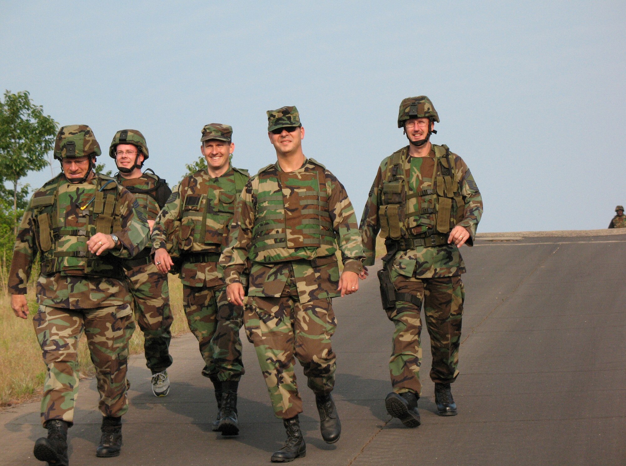 (Left to right) Chief Master Sgt. Timothy Lawrence, Staff Sgt. Patrick Casserleigh, Tech. Sgt. William Kindelspire, Maj. Christopher Simpson, and Senior Master Sgt. Leonard Jordan complete a 3.5-mile ruck march with 40 pound vests around Duke Field as part of the 919th Security Forces Squadron fitness program. Within the next couple of months, members will build the equipment weight carried on the march to 80 pounds. (U.S. Air Force Photo\Master Sgt. Paul Morales)