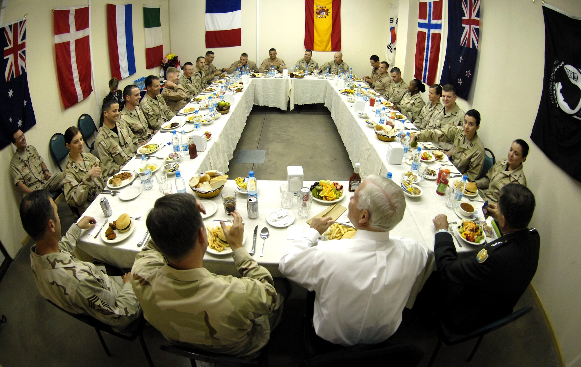 Secretary of Defense Robert M. Gates meets with junior Air Force officers deployed to Manas Airbase, Kyrgyzstan, June 5. Secretary Gates held the informal meeting to hear directly from the troops about their concerns and to answer their questions.  (DOD photo/Cherie A. Thurlby)