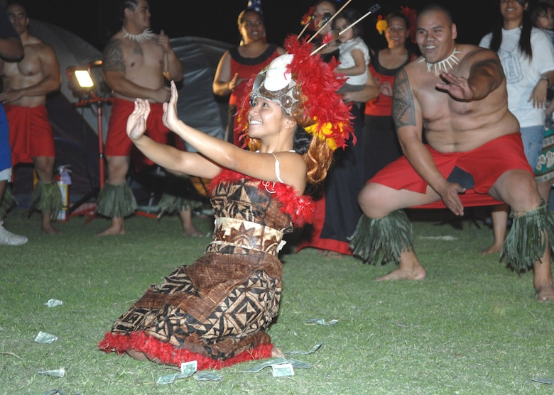 Performers demonstrate a traditional Polynesian dance at the Asian/Pacific American Heritage Luau at Bama Park here June 1. (U.S. Air Force photo/Senior Airman Christina D. Ponte)