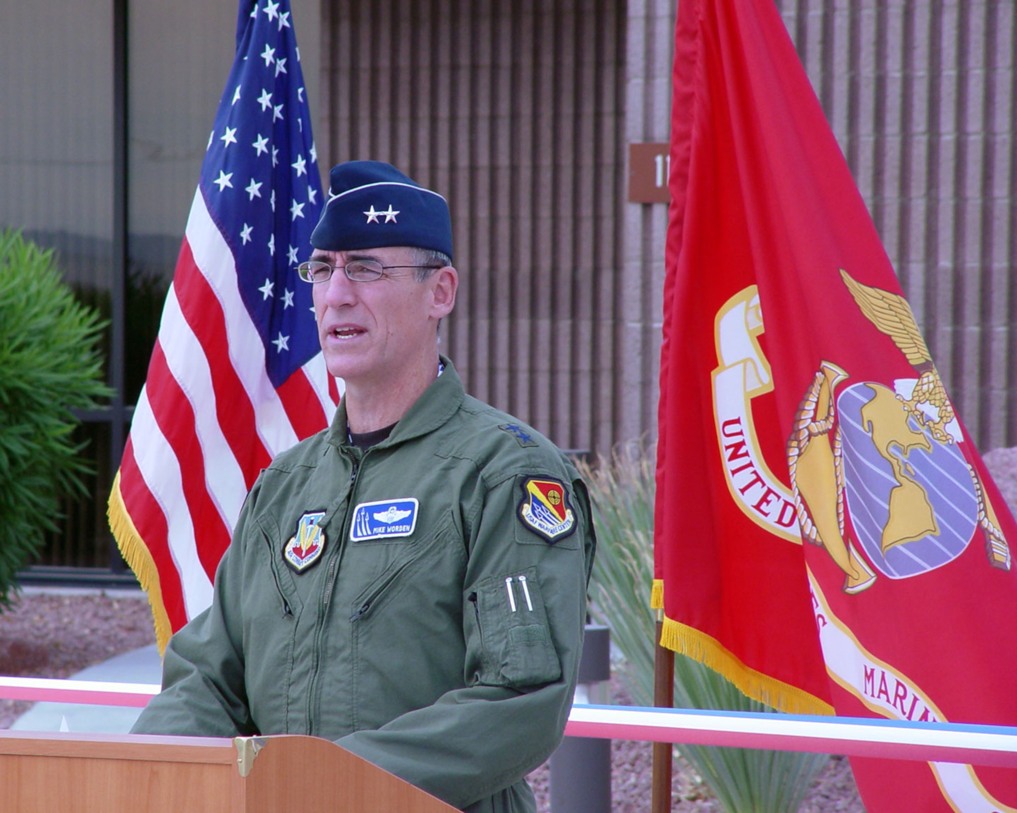 Maj. Gen. Mike Worden, U.S. Air Force Warfare Center commander, speaks to attendees at a ribbon cutting ceremony officially reactivating the 561st Joint Tactics Squadron, June 5. After a decade of inactivity, the 561st JTS was reactivated as the single focal point for deployment-preparation training and capturing tactical lessons learned. (USAF Photo)