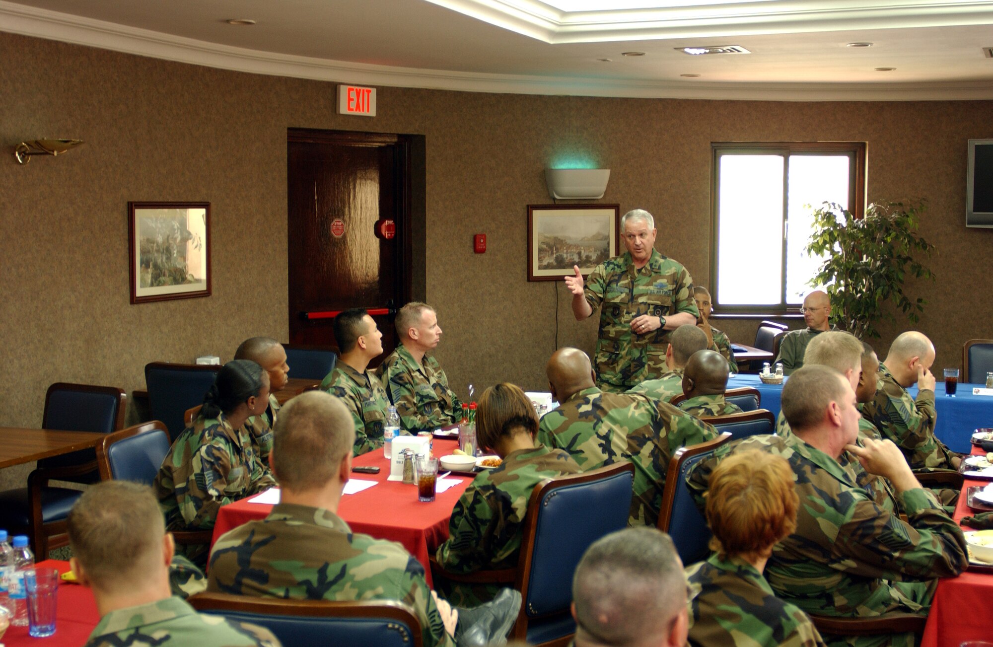 Maj. Gen. Paul Fletcher 3rd Air Force Vice Commander, informs a Technical Sergeant about the current changes in the Air Force and how its going to effect Incirlik in the Sultans Inn June 6. Many issues were addressed and discussed during the Dv's open forum conversation today. (U. S. Air Force photo by Airman First Class Timothy A. Taylor)
