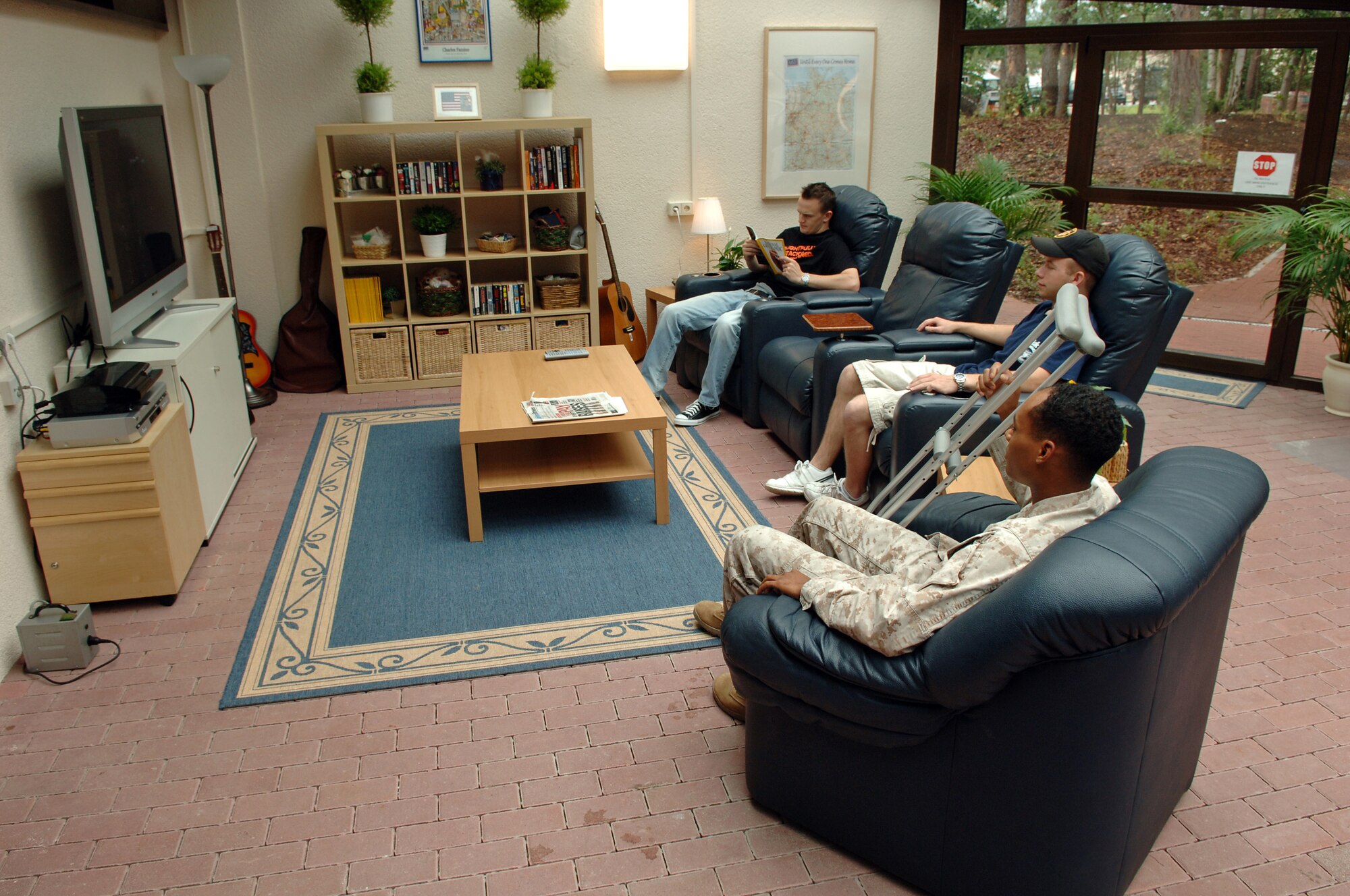 Patients at the 435th Contingency Aeromedical Staging Facility lounge in the newly-expanded USO center. The USO recently more than doubled its space within facility, which provides care and support for pateints flown into Ramstein from Iraq, Afghanistan and other areas. 