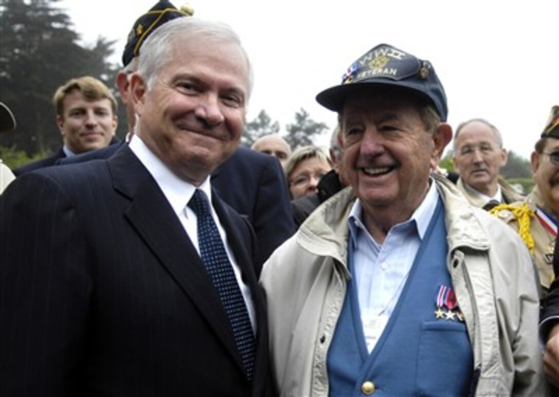 Secretary of Defense Robert M. Gates meets with World War II veterans during the Commemeration of the 63rd Anniversary of D-Day in Normandy, France, June 6, 2007.  