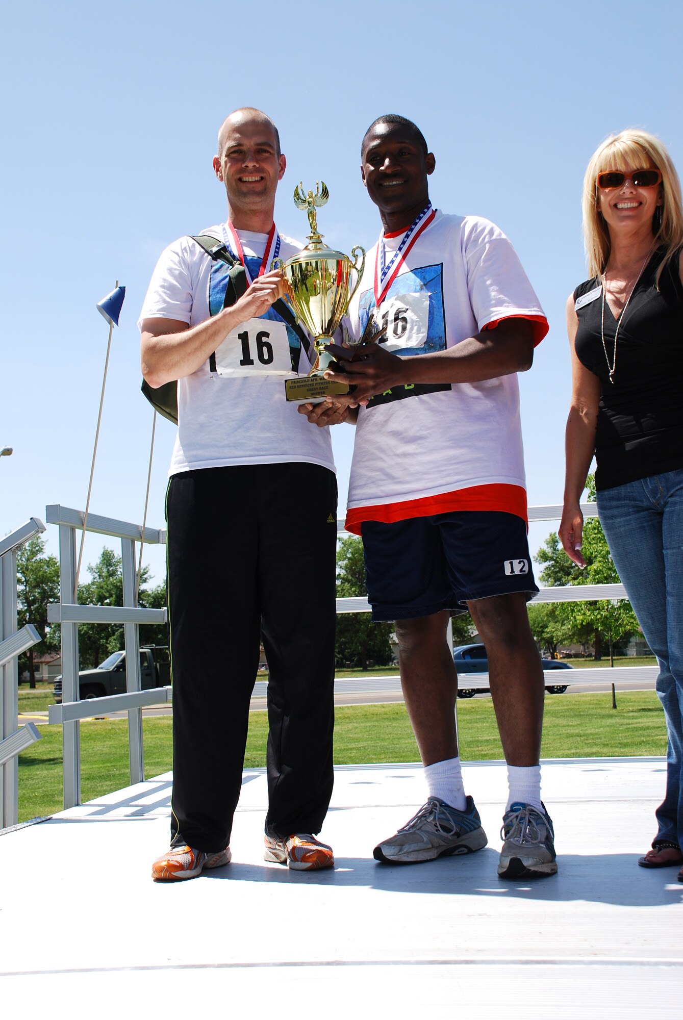 FAIRCHILD AIR FORCE BASE, Wash. -- Lt. Col. Michael Gaal, 92nd Operations Support Squadron commander and Master Sgt. Calvin Wilson, 92nd Operations Group first sergeant pose with their trophy after winning Fairchild’s second annual Great Race.  The two made up the team “The Old Wizards” and took first place by only 15 points over the second place team from security forces. (U.S. Air Force Photo / Staff. Sgt. Mikel Daniel)

