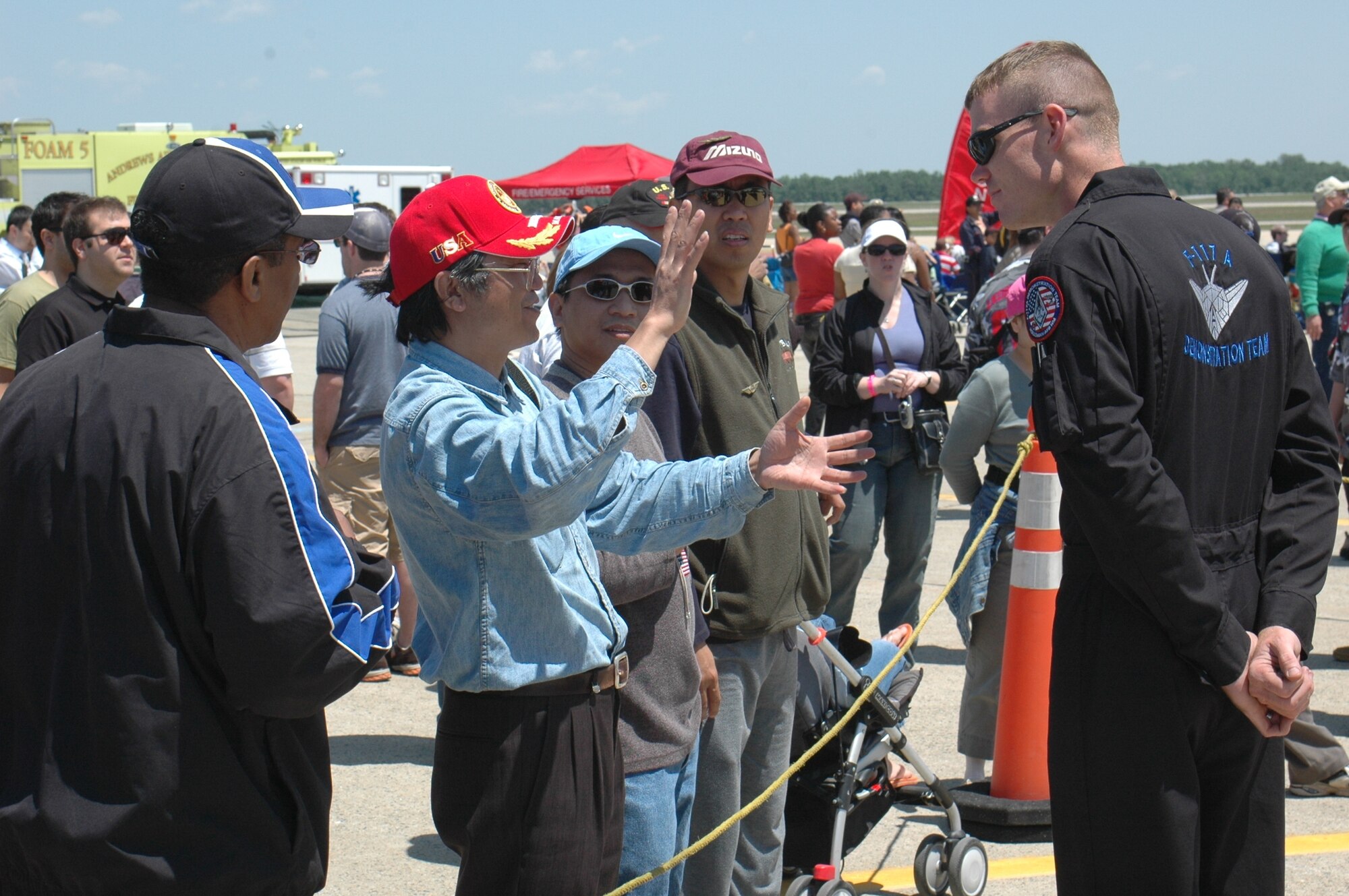 A crowd of F-117 enthusiasts ask Staff Sgt. Jody Daniels, a member of the F-117 Demo Team, questions about the jet at the Andrews Air Force Base air show, held in Maryland recently. (U.S. Air Force photo by 1st Lt. Phillip Ventura)