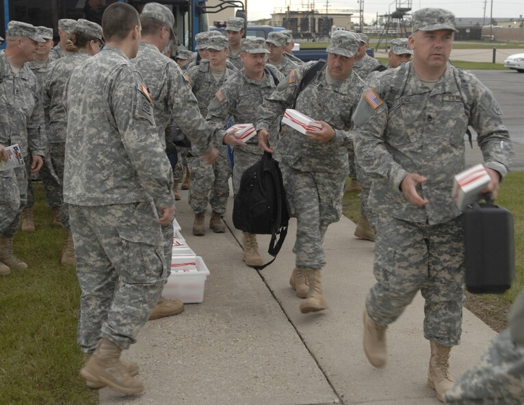 MINOT AIR FORCE BASE, N.D. – Soldiers from the North Dakota National Guard's 164th Engineer Battalion board a 737 aircraft on the flight line here en route to Camp Shelby Miss. prior to being deployed to a forward location in Iraq. The 119 Soldiers will be for approximately a year before returning to the U.S. (U.S. Air Force photo by Senior Airman Christopher Boitz)