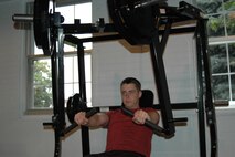 Senior Airman Donald Schulz, with the 388th Operations Support Squadron intelligence shop, exercises at the new pilot gym built on the first floor of the 388th Fighter Wing headquarters building.The location is within easy walking distance of the flightline for easy access to the pilots.