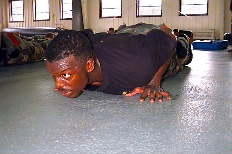 A student in a July 1998 Air Force Phoenix Raven Training Course class exercises with a push-up as part of physical training for the course at Fort Dix, N.J.  The Raven program recently celebrated 10 years in training having been established in 1997.  The course is taught by the U.S. Air Force Expeditionary Center's 421st Combat Training Squadron, also at Fort Dix.   (Air Force Photo)