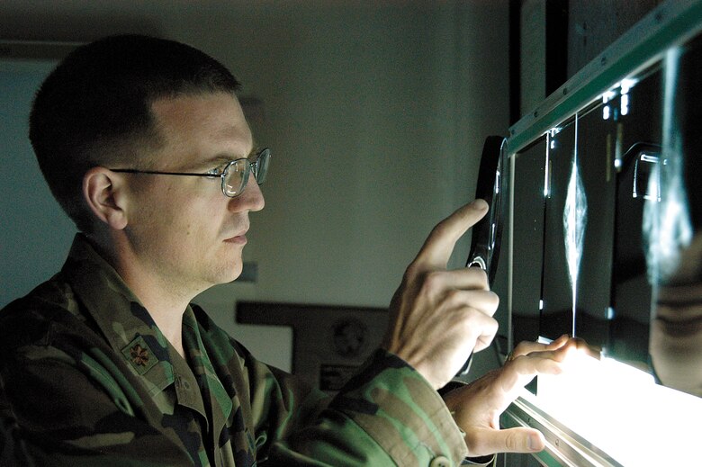 Tinker radiologist, Maj. (Dr.) Jason Wagner reviews mammograms in his 72nd Medical Group office.  Approximately 1500 mammograms are performed here annually. (Air Force photo by Margo Wright)
