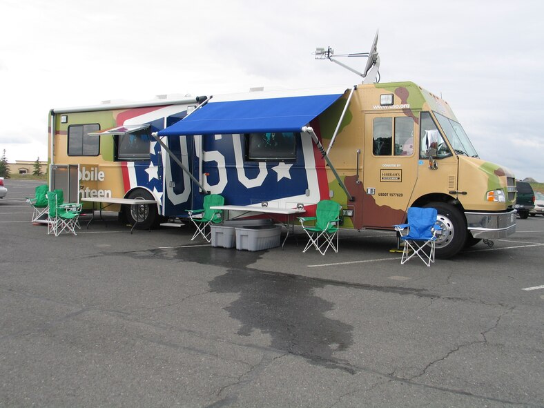 FAIRCHILD AIR FORCE BASE, Wash. -- One of three stateside USO Mobile Canteens visited Fairchild June 5-6, bringing USO services directly to Fairchild. Canteen visitors were invited to record messages and sign banners for troops stationed overseas, and check out USO programs and services. The canteen features a plasma flat-screen TV, xBox and gaming station, and a snack bar. (U.S. Air Force photo/Staff Sgt. Connie L. Bias) 
