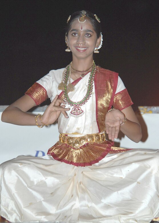 Vaishnavi Vaidyanathan, a member of the Arathi School of Indian Dances, performs a traditional dance during the Asian/Pacific American Heritage Luau at Bama Park here June 1. (U.S. Air Force photo/Senior Airman Christina D. Ponte)